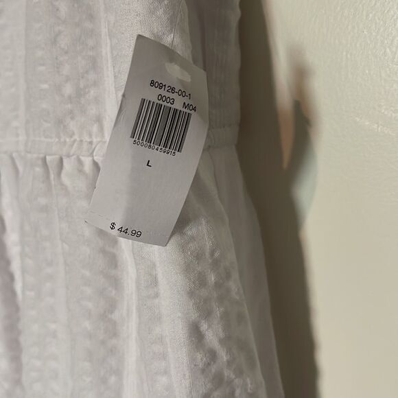 Elegant White Sleeveless Dress - Picture 6 of 6